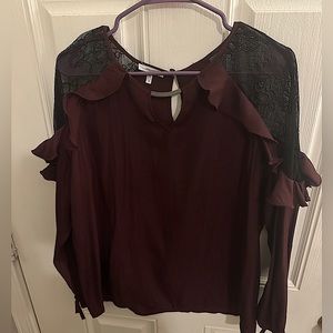 Maurice’s plus size blouse with cut out lace shoulders.